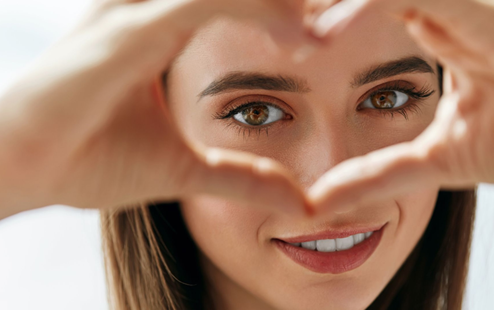 Girl Making a Heart With Hands